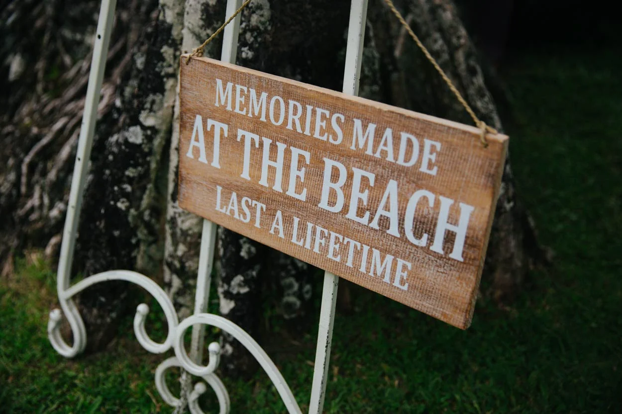 Detail photo of beach wedding decor and arch florals at Indian Rocks Beach