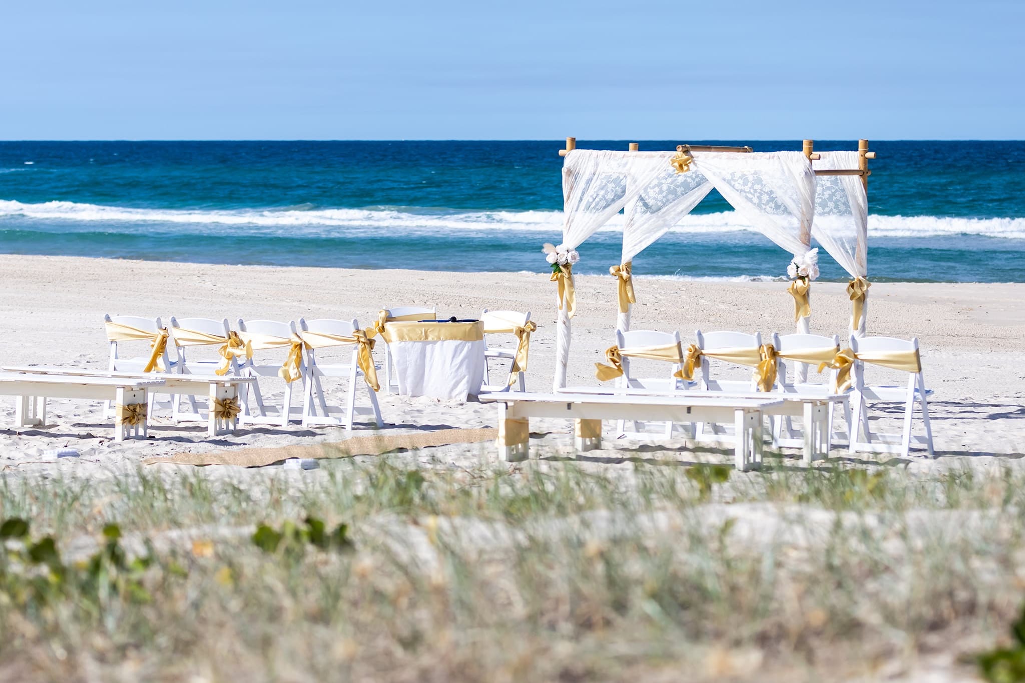 Jessica and Donald’s romantic Clearwater Beach wedding ceremony by Vows By The Sea