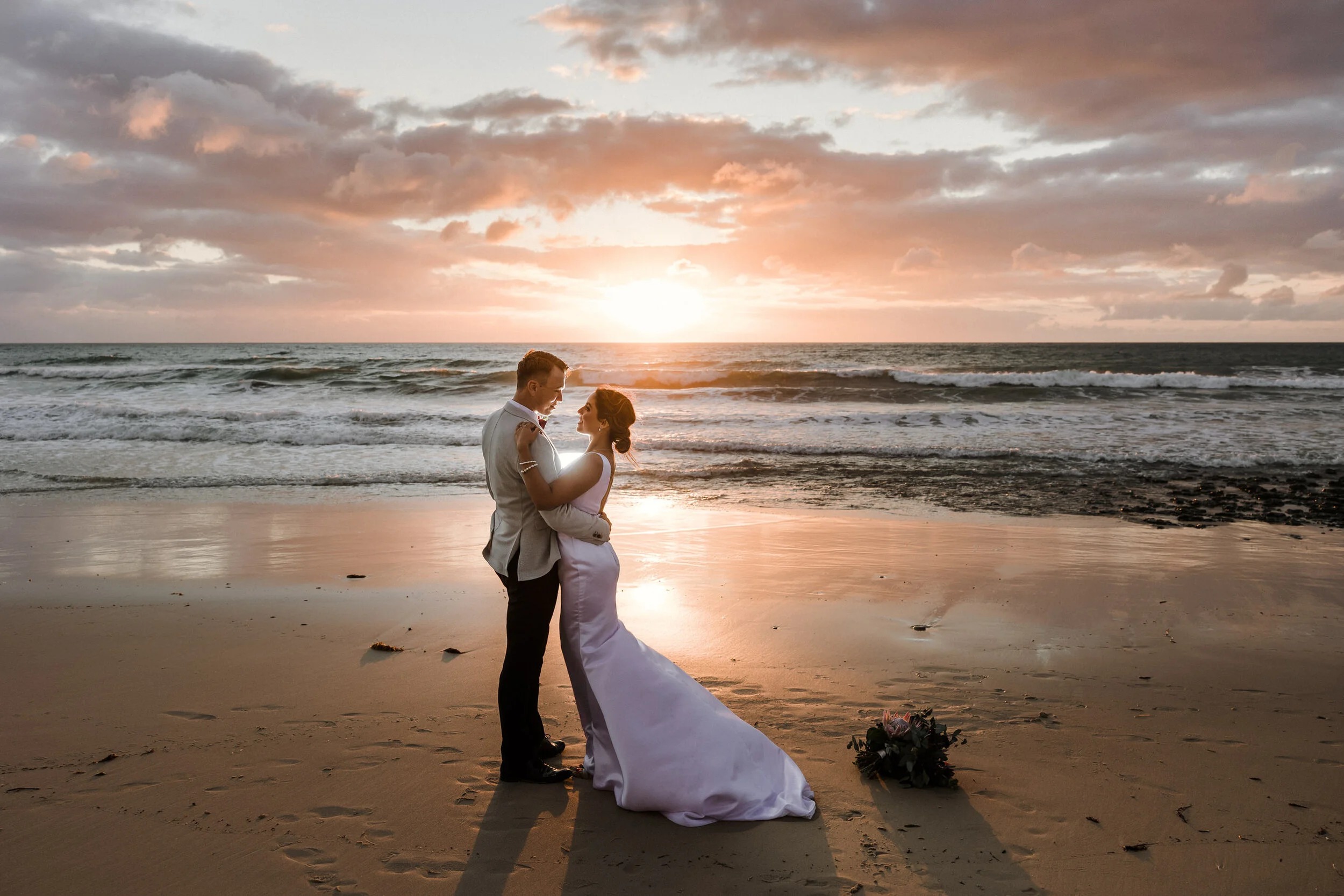 Clearwater Beach elopement couple walking by the shoreline