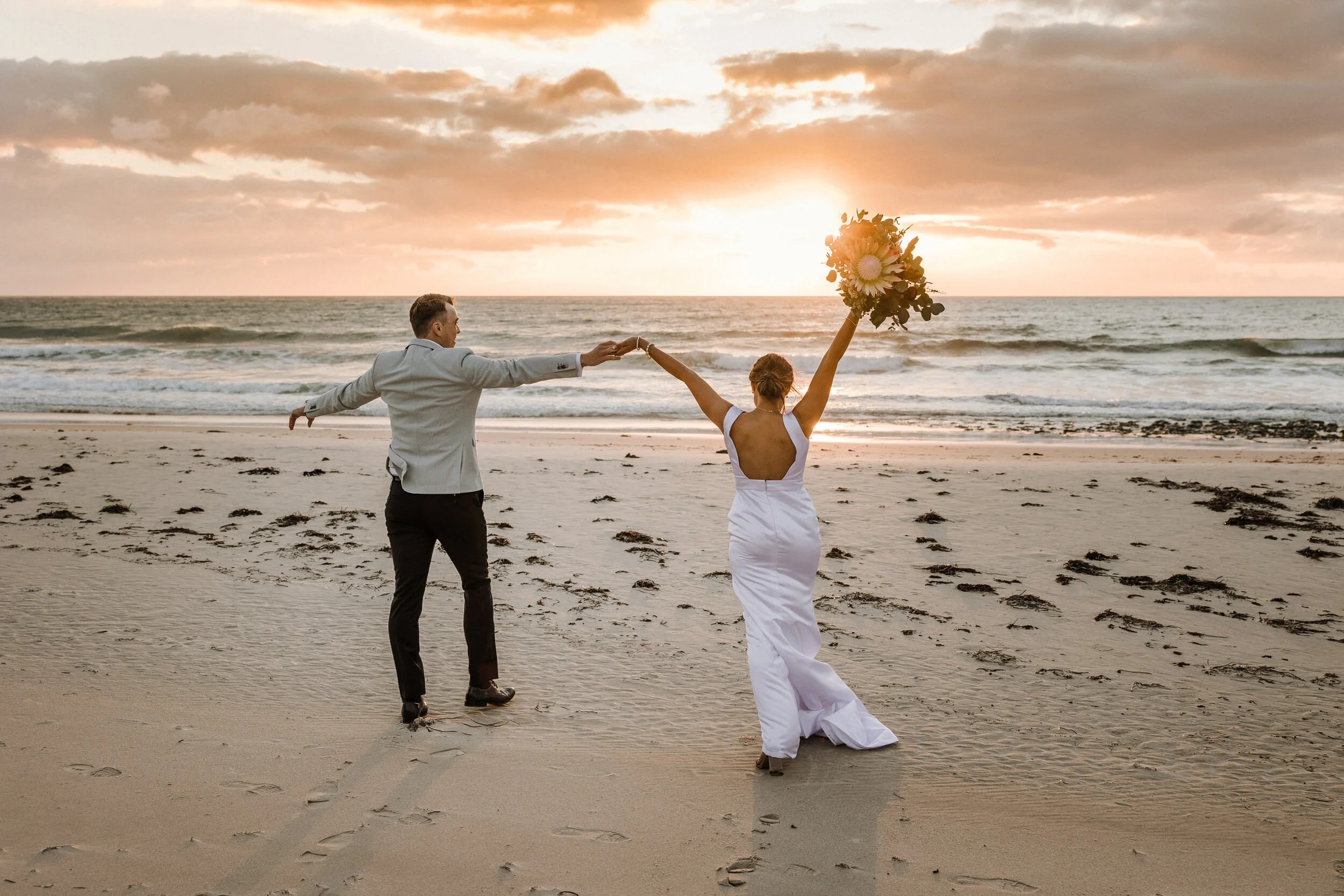 Couple celebrating intimate Clearwater Beach elopement