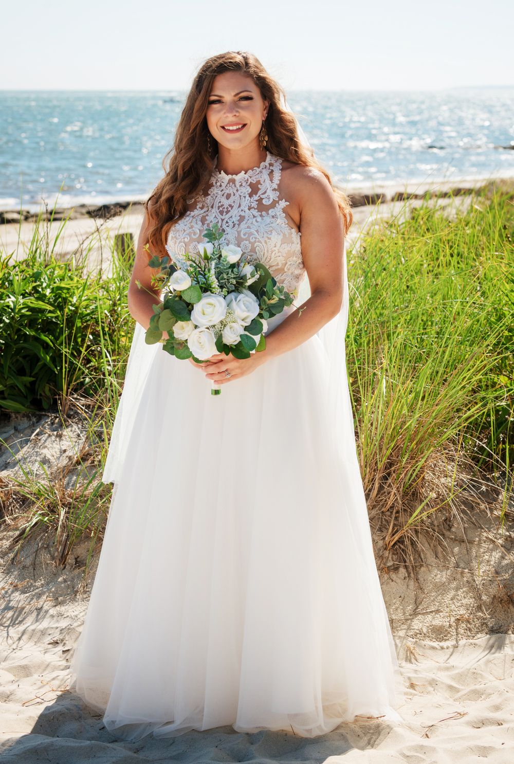 Ceremony setup at Upham Beach with Gulf Coast backdrop
