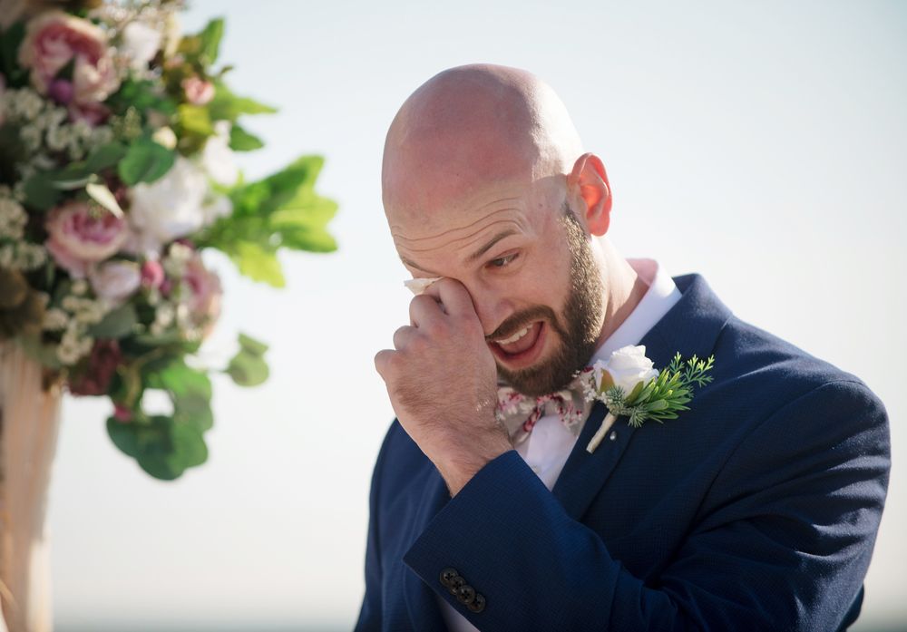 Sandy and Brend exchanging vows at Upham Beach